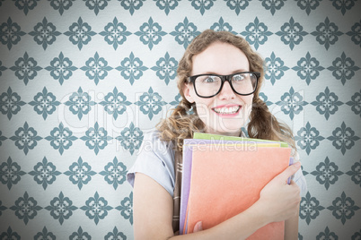 Composite image of geeky hipster woman holding files