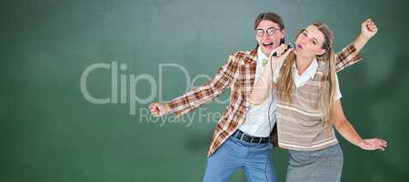 Composite image of happy geeky hipsters singing with microphone