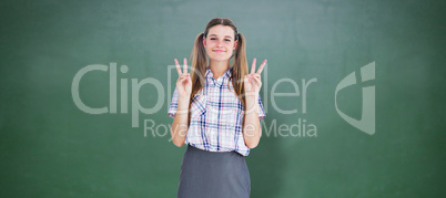 Composite image of geeky hipster smiling at camera