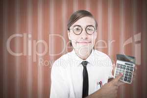 Composite image of geeky smiling businessman showing calculator