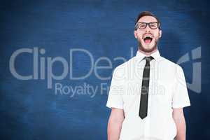 Composite image of geeky young businessman shouting loudly
