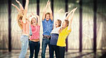 Composite image of group of friends cheering as they jump in the