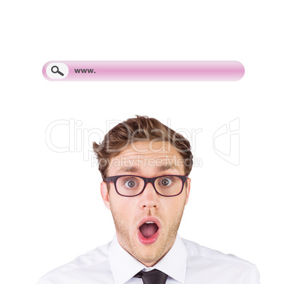 Composite image of geeky businessman looking at camera