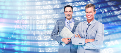 Composite image of  business team standing arms crossed and with