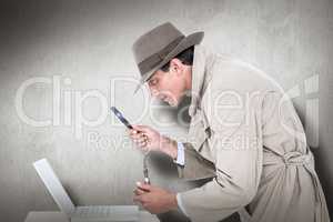 Composite image of spy looking through magnifier