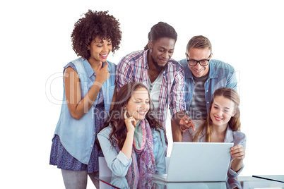 Composite image of fashion students working as a team Composite image of fashion students working as a team