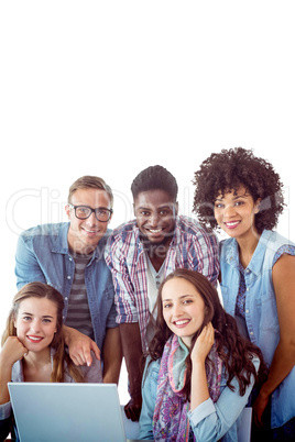 Composite image of fashion students working as a team