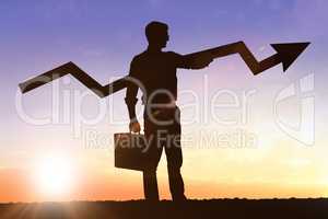 Composite image of businessman with arrow