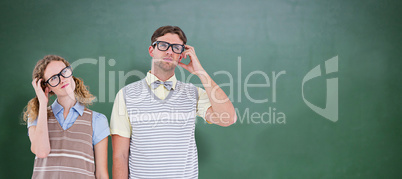 Composite image of geeky hipster couple thinking with hand on te