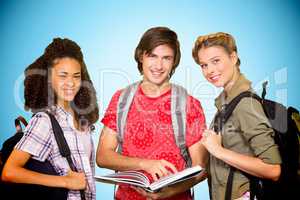 Composite image of college students reading book in library