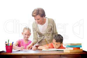 Composite image of teacher helping pupils in library