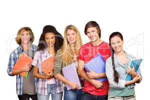 Composite image of college students holding books in library