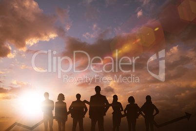 Composite image of business team with arrow Composite image of business team with arrow