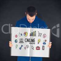 Composite image of manual worker showing a book