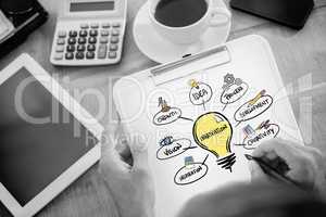 Composite image of man writing on clipboard on working desk