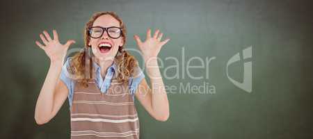 Composite image of geeky hipster woman smiling and showing her h