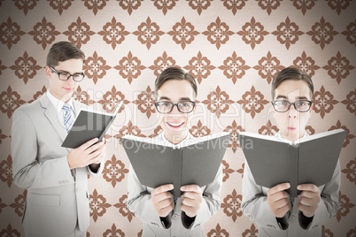 Composite image of nerd reading book