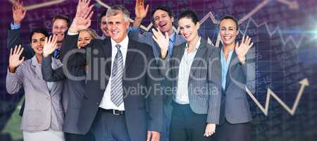 Composite image of smiling business team waving at camera