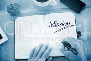 Mission against man writing notes on diary