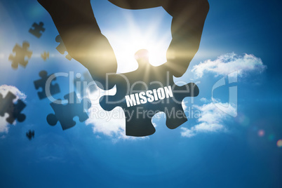 Mission against bright blue sky with clouds