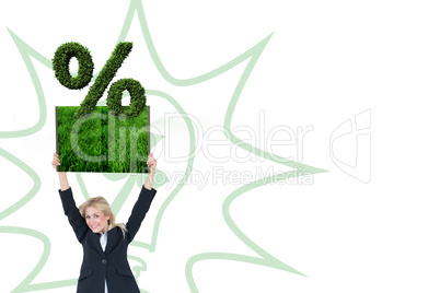 Composite image of woman holding up lawn book