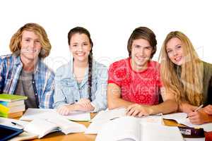 Composite image of college students doing homework in library