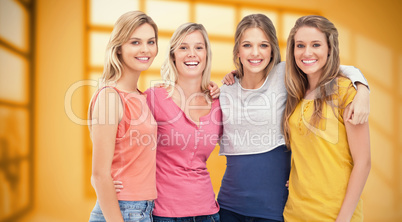 Composite image of four friends standing beside each other and s