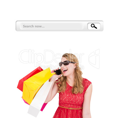 Composite image of pretty blonde talking on phone holding shoppi