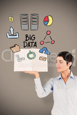 Composite image of businesswoman showing a book