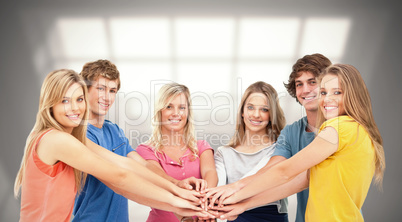 Composite image of friends standing around each other as they st