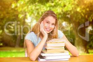 Composite image of portrait of female student in library