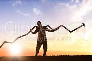 Composite image of businessman with arrow