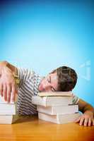 Composite image of student asleep in the library