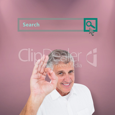 Composite image of casual man showing ok sign to camera
