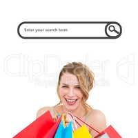 Composite image of portrait of a smiling woman with shopping bag