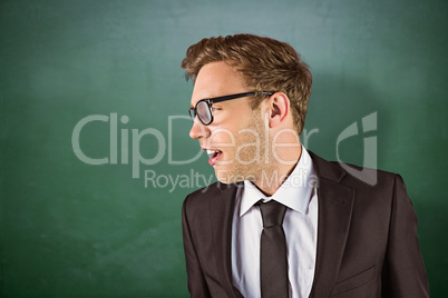 Composite image of young handsome businessman looking away Composite image of young handsome businessman looking away