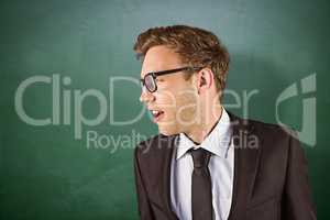 Composite image of young handsome businessman looking away