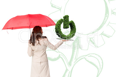 Composite image of woman with umbrella and lawn book