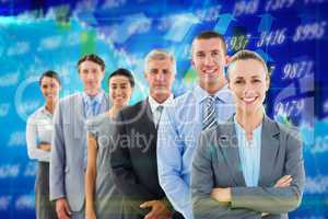Composite image of smiling business team standing in a line