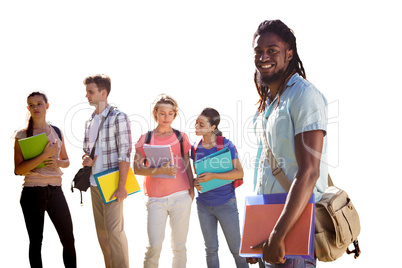 Composite image of happy students outside on campus