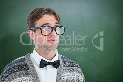 Composite image of thoughtful geeky hipster