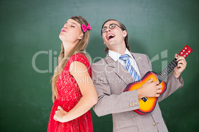 Composite image of hipster couple having fun together