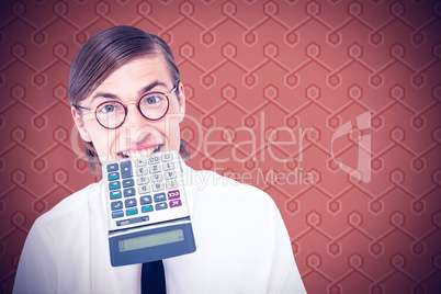 Composite image of geeky smiling businessman biting calculator