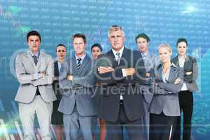 Composite image of business team standing arms crossed