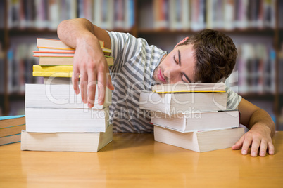 Composite image of student asleep in the library