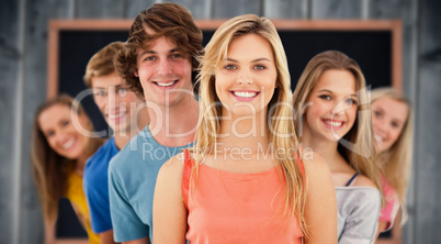 Composite image of group standing behind one another at varied a