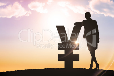 Composite image of silhouette beside yen symbol