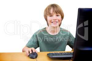 Composite image of school kid on computer