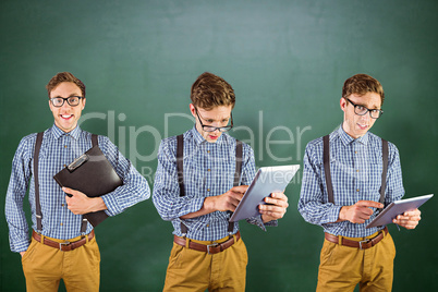 Composite image of nerd with tablet pc