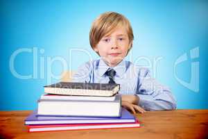 Composite image of cute pupil with books